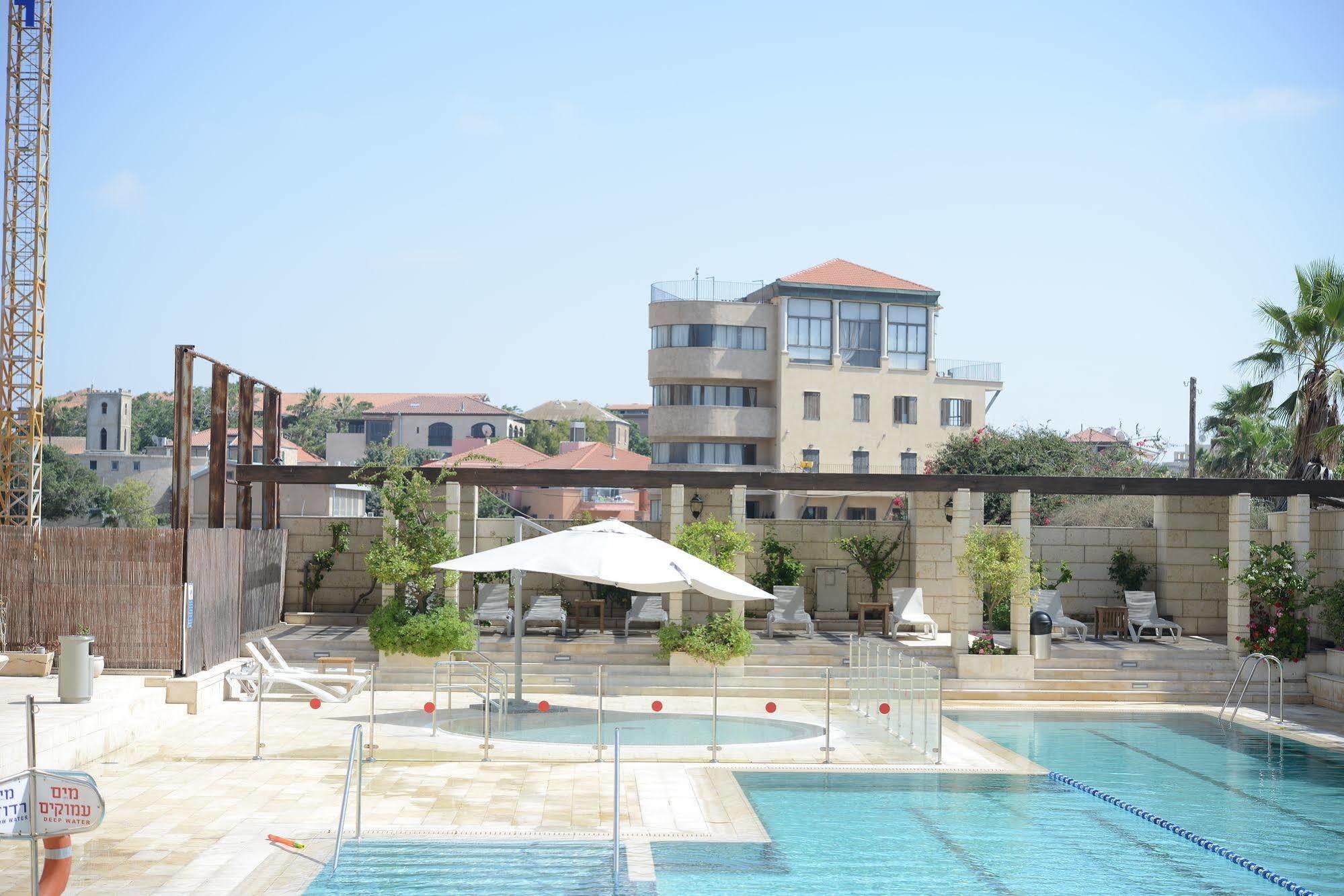 Andromeda Hill Apartments And Spa Tel Aviv Exterior photo